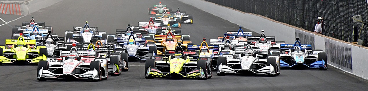 indy cars racing to through the start line Minneapolis