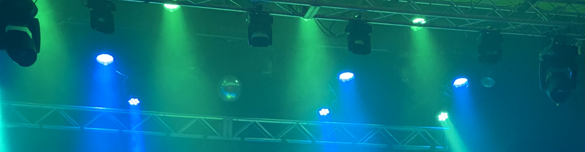 blue and green theater stage lights Minneapolis