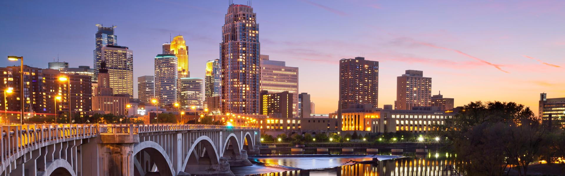Neon color image of a band playing and people singing along